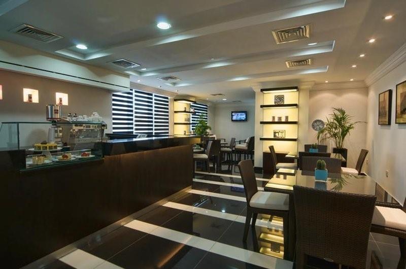 Retaj Residence Al Corniche 多哈 餐厅 照片